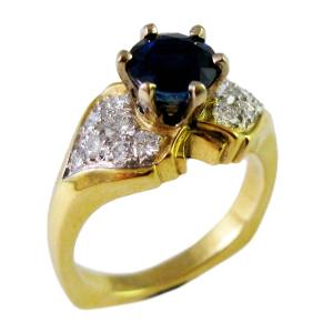 14k yellow gold with platinum mounting<span>1.75ct sapphire, 0.37ct tw dia</span>